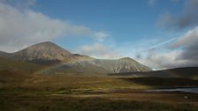 Skye landscape with rainbow