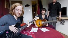 Simon, James and Ben warming up in the bedroom