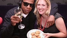 Natalie Jamieson serves Jay-Z the cookies she baked for him.