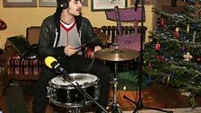 Jack's drummer makes himself comfy by the tree