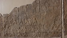 2) Assyrians storm the walls using a ramp of rubble and earth faced with wood