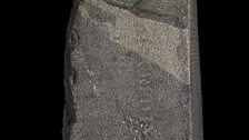 Zoom of the side of the Rosetta Stone with an inscription made by the British Army