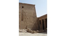 A temple court at Philae in Egypt with a stela like the Rosetta Stone in place