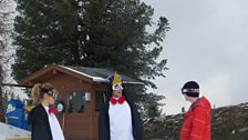 Even the snowboarders are in fancy dress! These penguins look confused!