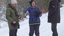 Tom Arnbom and Torbjorn Hegedus from the WWF with reporter Mary Colwell