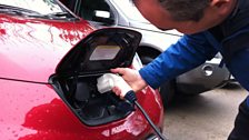 Melvyn plugs in his electric car