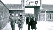 Walter Sisulu, Andrew Mlangenis and their Wives Returning to Robben Island