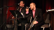 Houseband Alex Horne and The Horne Section in action