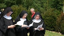 Singing in the grounds of Stanbrook Abbey. Copyright Stanbrook Abbey.