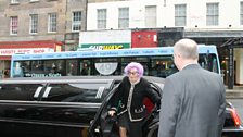 Dame Edna arrives in style