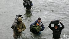 Returning to camp through a river