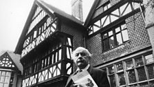 Sir John Betjeman at Grims Dyke, Harrow Weald, designed by Norman Shaw