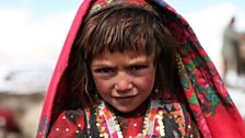 One of the Wakhan Valley children dressed in her best clothes ready for the Kuch -