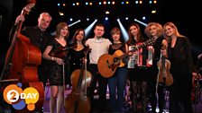 Dermot O'Leary with Emily Barker and band