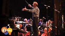 Mike Dixon conducts the  Concert Orchestra on 2Day