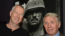 John Wilson with photographer Don McCullin and his photo Shell-shocked Soldier, Hue, 1968