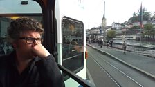 Tom on the tram in Zurich.