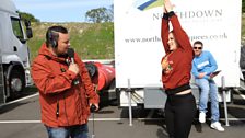 Katy B shows Charlie Sloth some dance moves