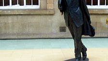 The sculpture of Philip Larkin by Martin Jennings which was erected in Hull Paragon interchange