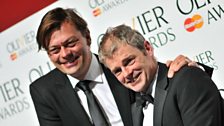 Writer Simon Stephens and author of the Curious Incident of the Dog in the Night-Time Mark Haddon at The Olivier awards