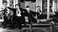 Laurel and Hardy perform a dance in the 1937 film, Way Out West