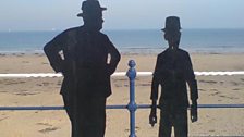 Seaside silhouettes of Stan Laurel and Oliver Hardy