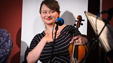 Eliza Carthy smiles at John Wilson