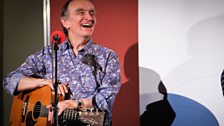 Martin Carthy shares a joke with John Wilson