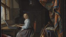 A Woman Playing A Clavichord