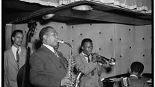 Tommy Potter (bass), Charlie Parker (saxophone) and Miles Davis (trumpet) at the Three Deuces in New York, 1947