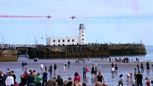 Red Arrows fly over Scarborough Lighthouse