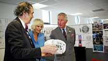 Their Royal Highnesses meet Michael Pickwoad (Production Designer) who shows them a model of the TARDIS.