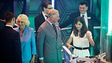 With Steven Moffat (Exec Producer and Lead Writer) in the background, Jenna Coleman explains the TARDIS to HRH Prince Charles.