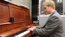 Pianist, Jonathan Storey, playing our studio piano in Maida Vale