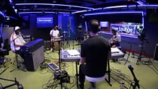 Robin Thicke and his band in the Live Lounge for Sara