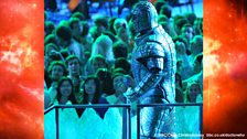 The audience gives an Ice Warrior a warm welcome.