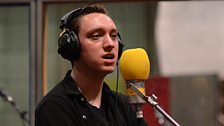 Oliver Sim sings at Maida Vale