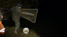 Elver fisherman on the banks of the River Severn