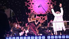 Nicola Benedetti and the 鶹ҳ Concert Orchestra on stage in Hyde Park for Proms in the Park, 2005