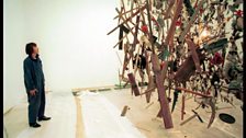 Cornelia Parker supervising the installation of her exploded shed artwork, Cold Dark Matter: An Exploded View, at Tate Modern