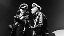 Mick Jones and Paul Simonon performing with Gorillaz at Glastonbury, 2010