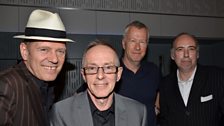 The Clash band members Paul Simonon, Nicky 'Topper' Headon and Mick Jones with Front Row presenter John Wilson