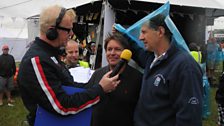 Jody Scheckter and James Martin dodge the rain with Chris