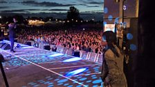 Diane hiding in the wings watching London Community Gospel Choir on the Mainstage