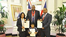 Mini, Shibu and Alun Abraham from India at their citizenship ceremony