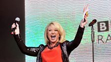 Elaine on the main stage, preparing to introduce Josh Groban.