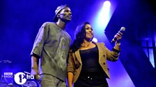 Wretch 32 and backing vocalist