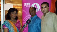 Jayna speaks to singer (left) and organiser (right) about Navratri celebrations at Jungle Club in Leicester