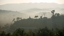 Misty hills with a pagoda