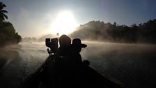 Silhouetted boat ride